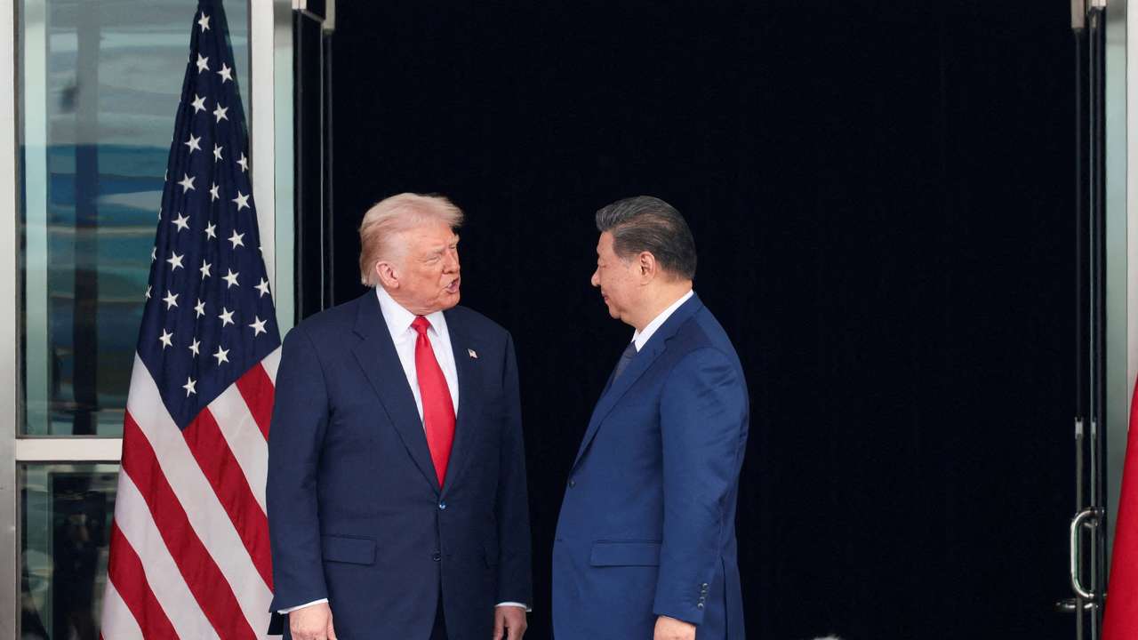 FILE PHOTO: U.S. President Donald Trump meets with Chinese President Xi Jinping on the sidelines of the APEC summit, in Busan