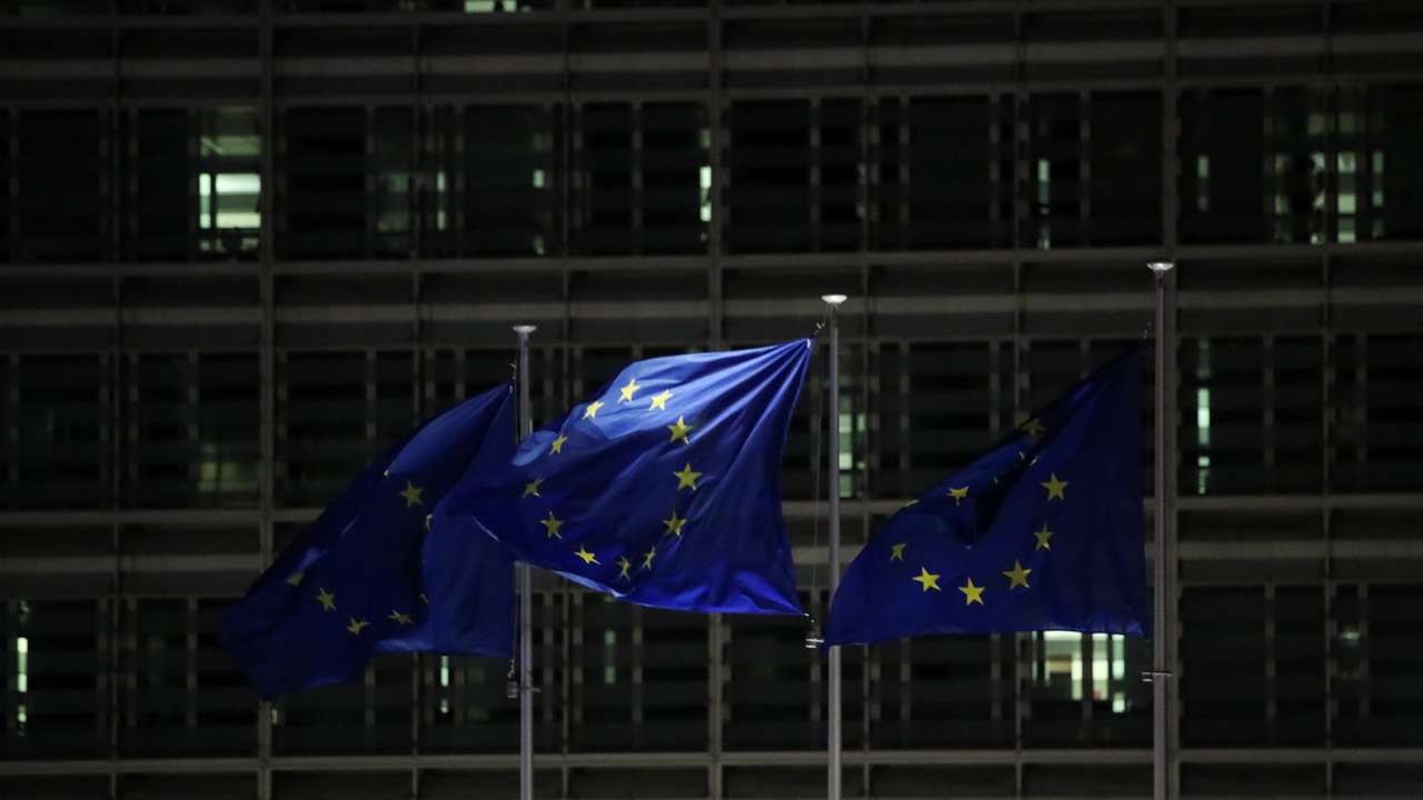 European Union flags flutter outside the European Commission headquarters in Brussels