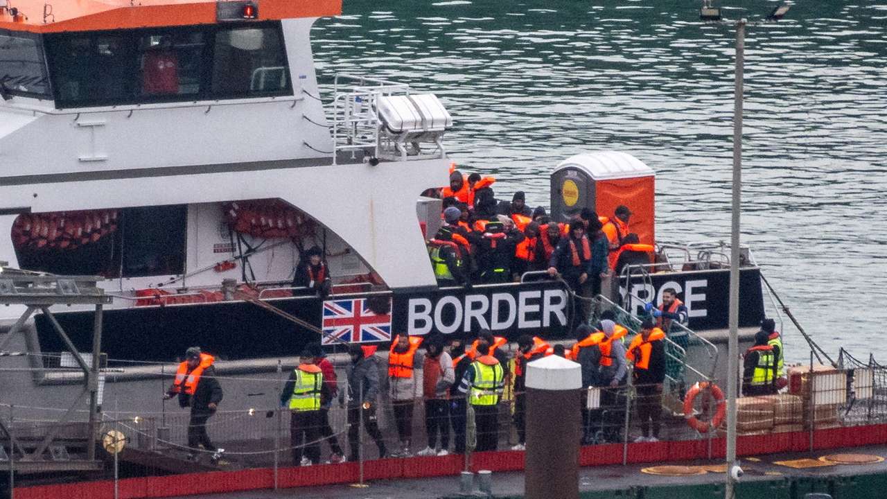 FILE PHOTO: Migrants arrive in the UK after crossing the English Channel