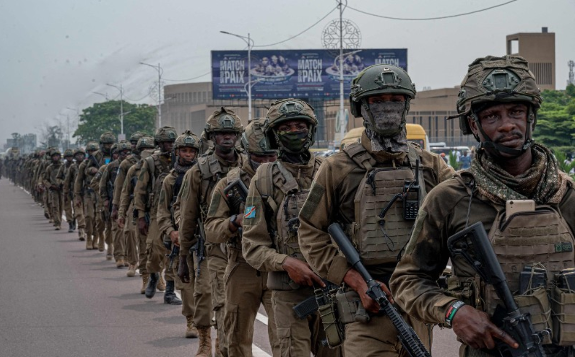 Democratic Republic of Congo Republican Guard soldiers walk in the streets of Kinshasa on March 1, 2025.