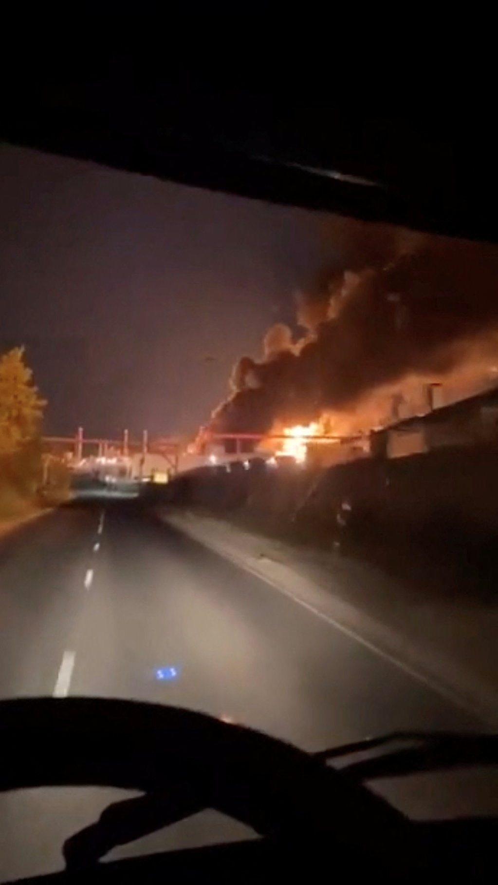 Smoke and fire rise from an industrial facility, in Saratov