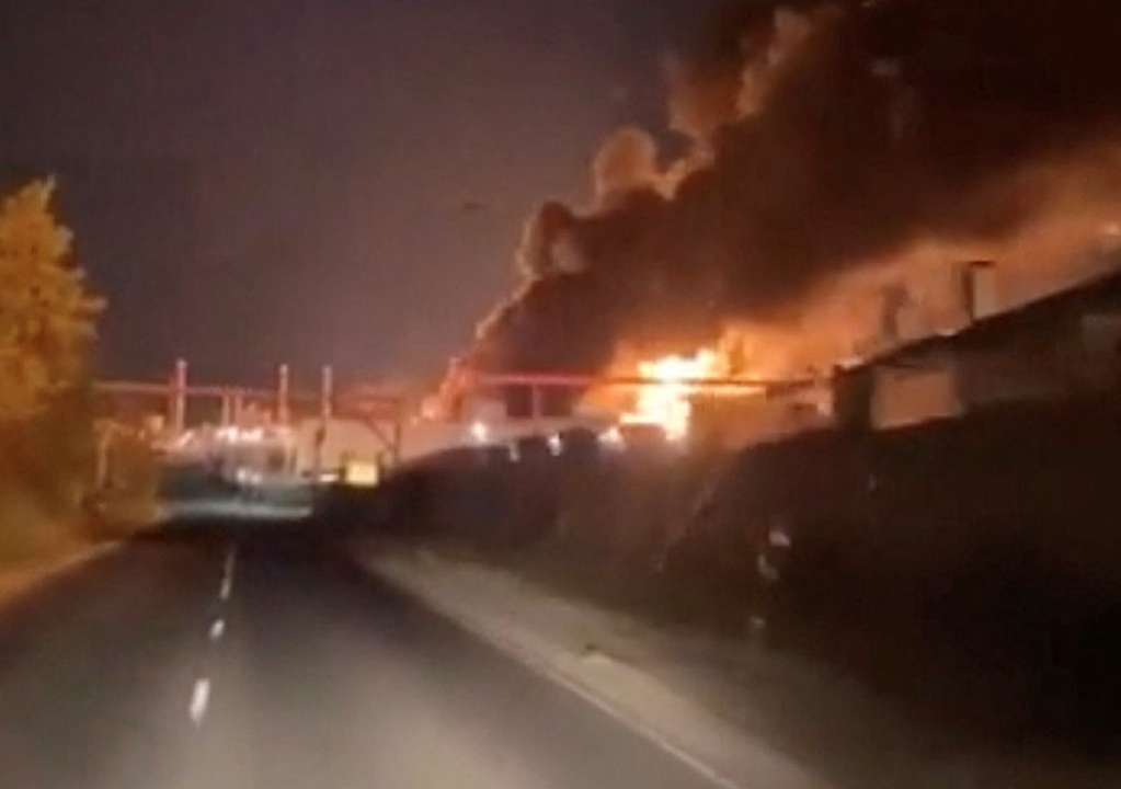 Smoke and fire rise from an industrial facility, in Saratov