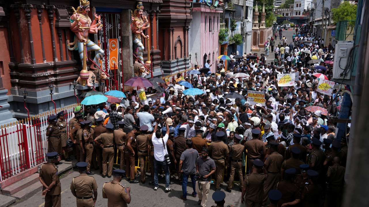 Supporters of Sri Lanka's former President Wickremesinghe gather ahead of his bail hearing, in Colombo