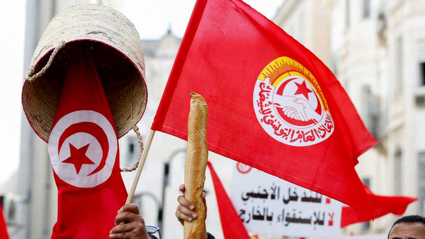 FILE PHOTO: Supporters of the Tunisian General Labour Union (UGTT) protest in Tunis