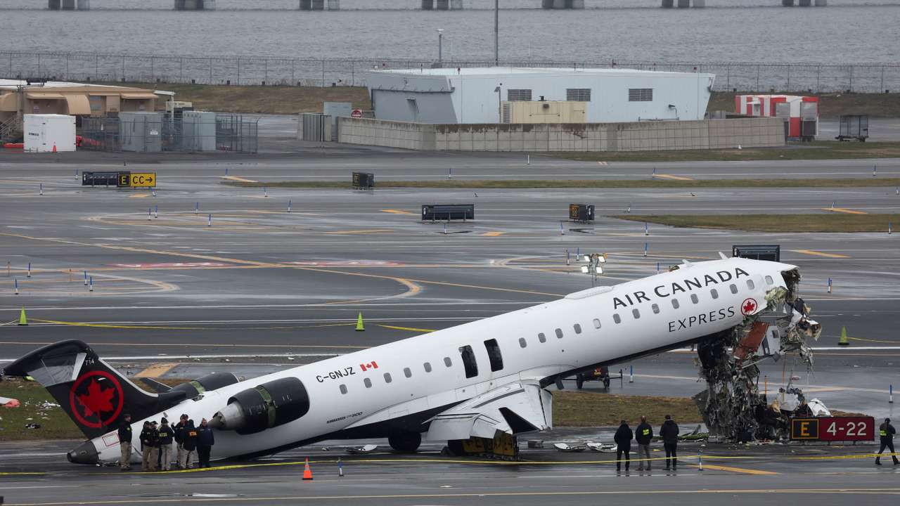 Air Canada Express jet collides with a ground vehicle at LaGuardia airport