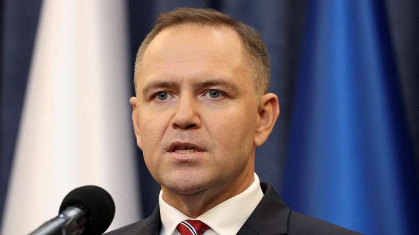 FILE PHOTO: Polish President Karol Nawrocki gives a statement to media at the presidential palace in Warsaw