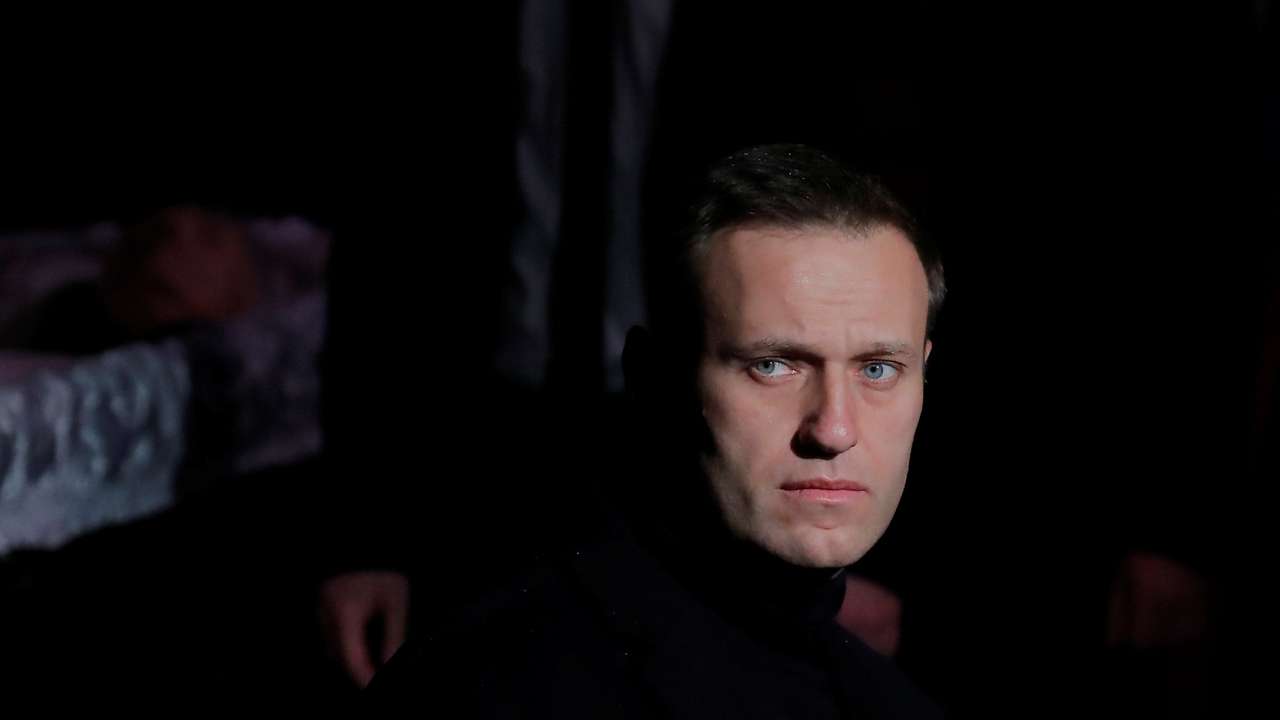 FILE PHOTO: Russian opposition leader Navalny pays respect to human rights activist Alexeyeva in Moscow