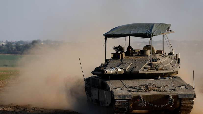 A tank manoeuvres near the Israel-Gaza border