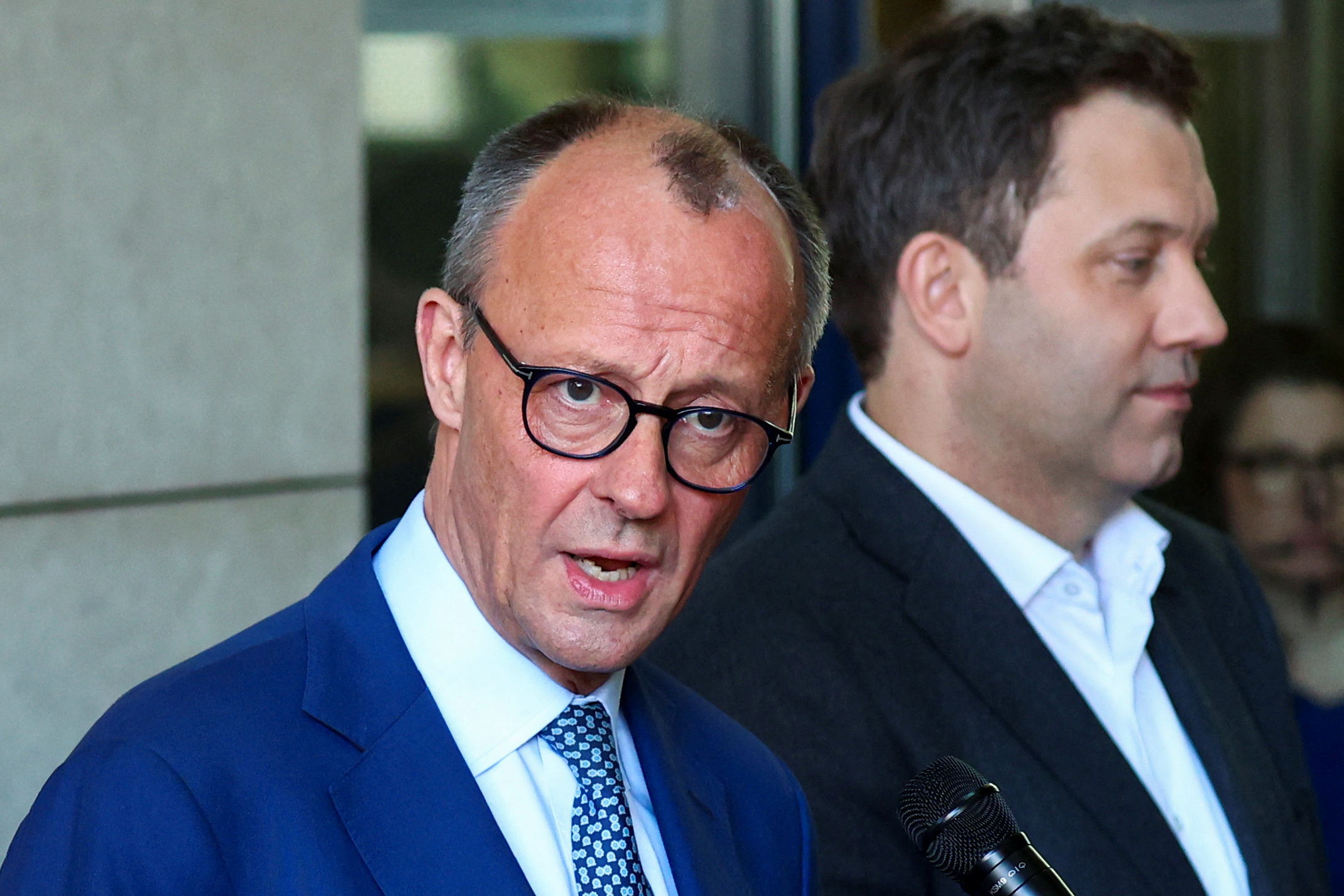 Germany's CDU conservatives and Social Democrats resume coalition talks, in Berlin
