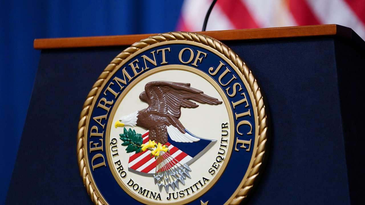 U.S. Justice Department seal is seen at Justice Department headquarters in Washington