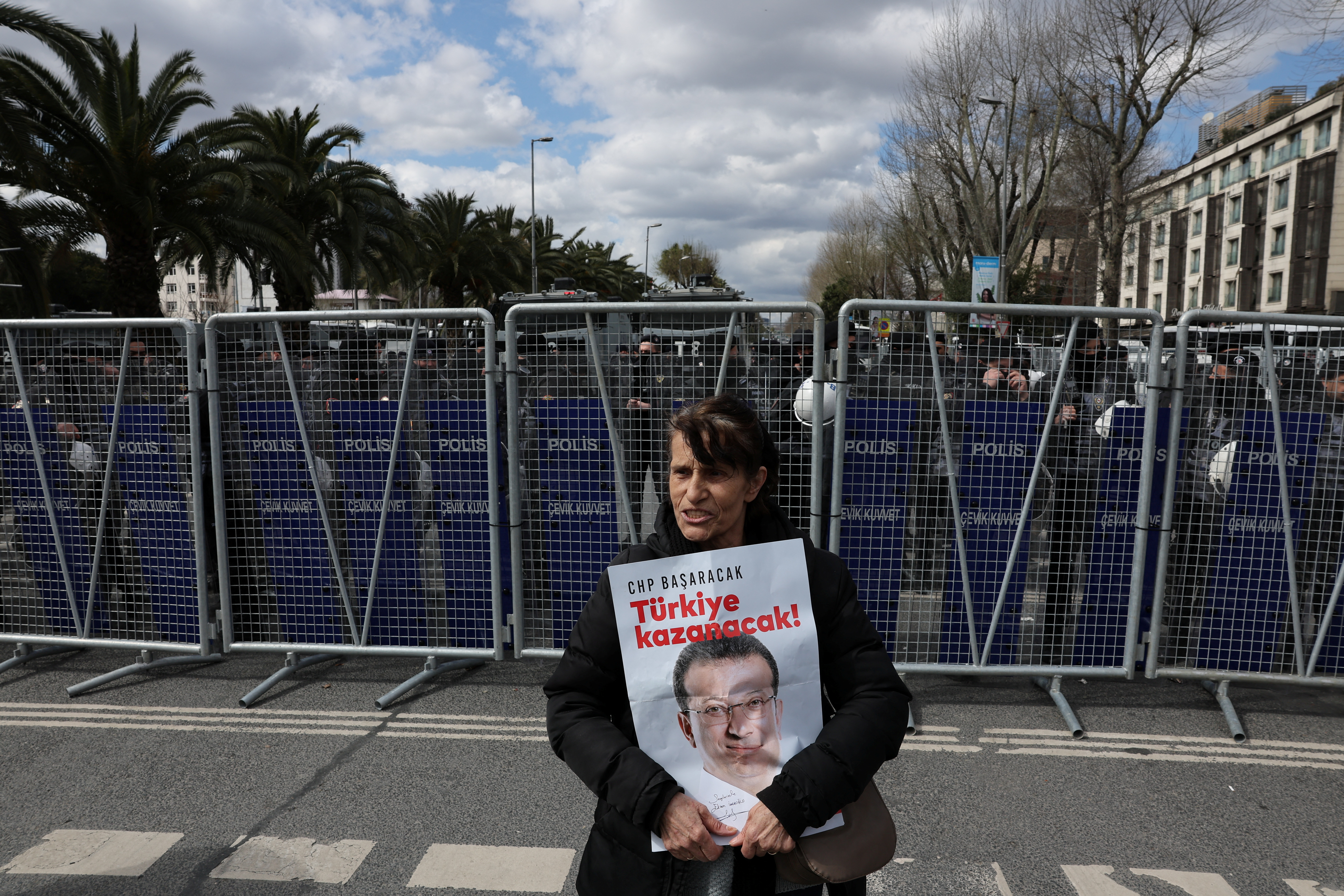 FILE PHOTO: Supporters of Istanbul Mayor Imamoglu gather near the city's police headquarters in Istanbul