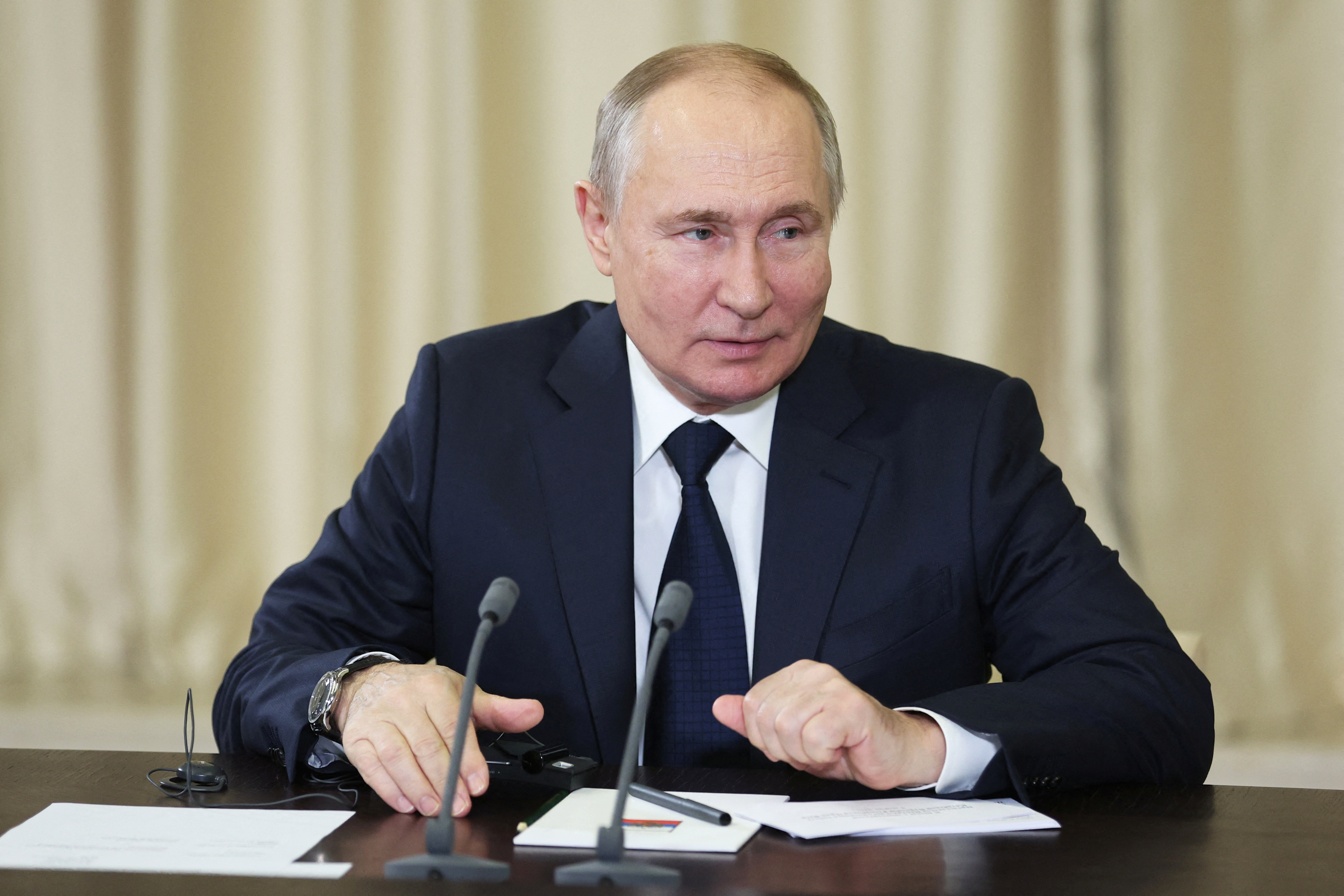 Russian President Vladimir Putin meets Defence Minister Sergei Shoigu and vice chairman of China's Central Military Commission General Zhang Youxia outside Moscow