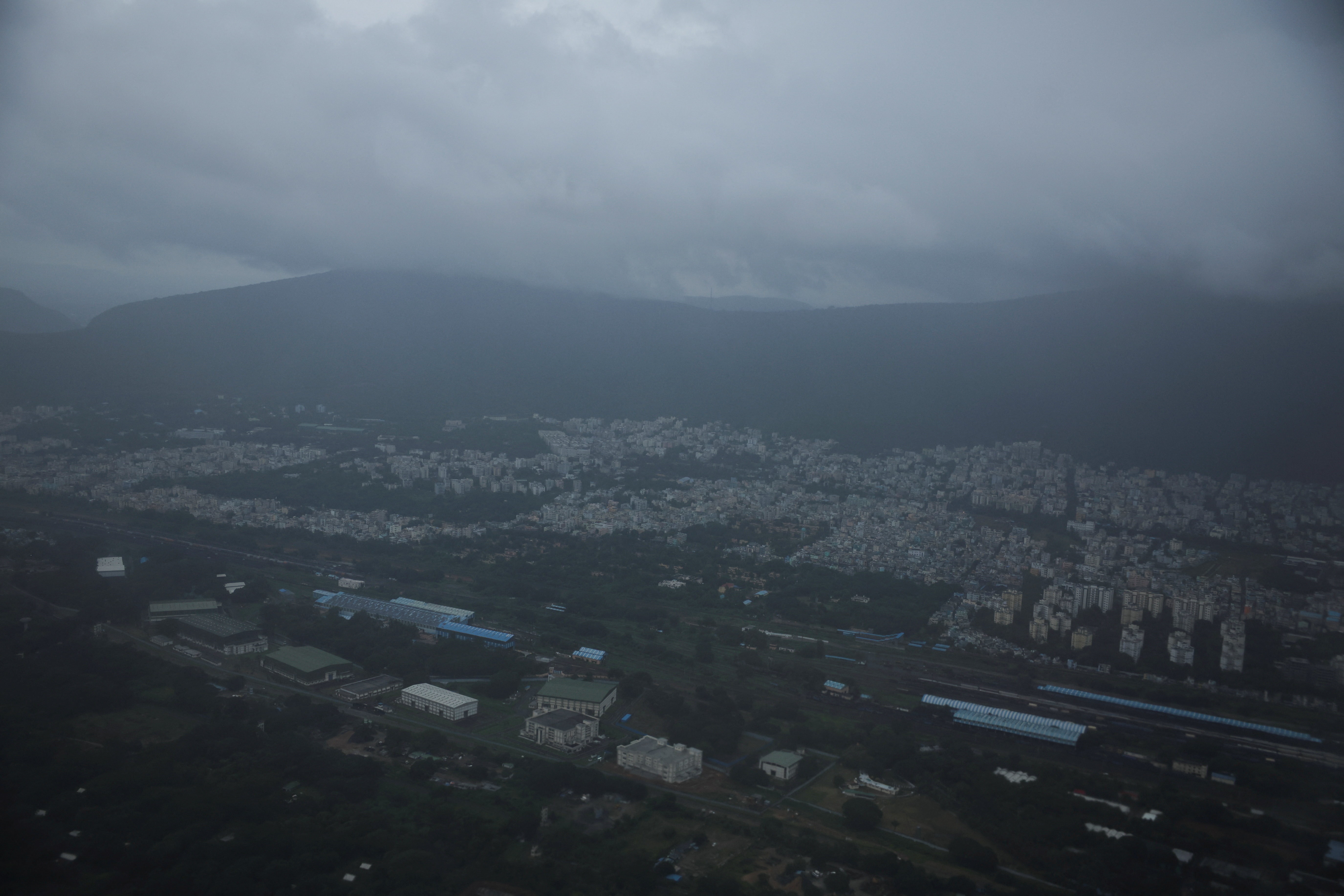 Clouds over the skyline of the city of Visakhapatnam before Cyclone Montha makes landfall near Kakinada district in the state of Andhra Pradesh
