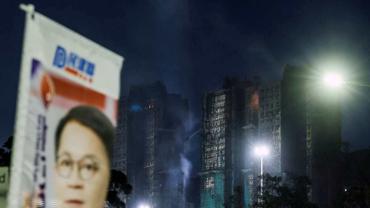 FILE PHOTO: Election sign for the upcoming Legislative Council election near the Wang Fuk Court housing complex in Hong Kong