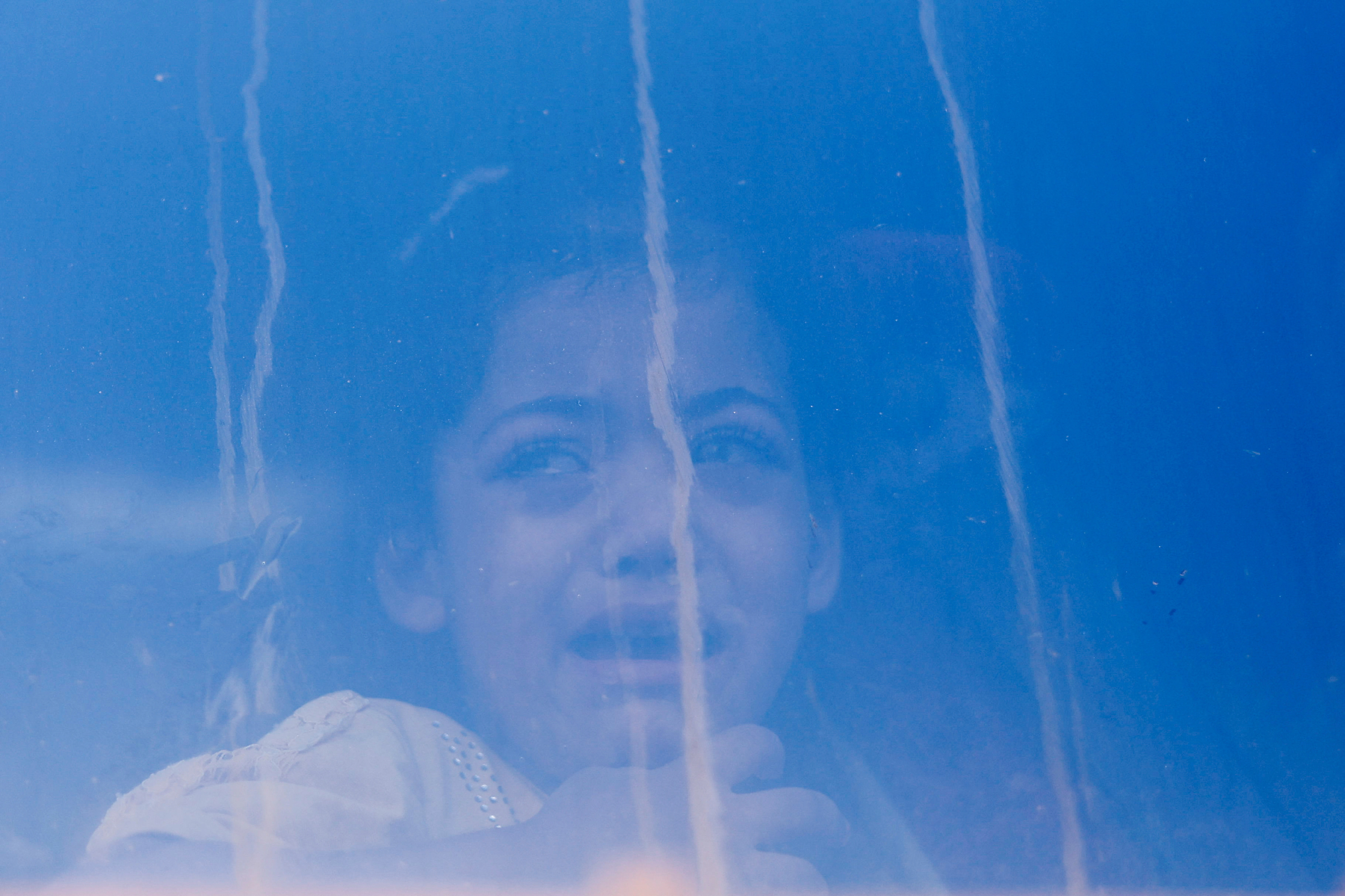 Palestinians say goodbye to patients before they are transferred for treatment abroad