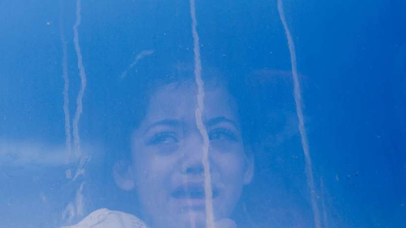 Palestinians say goodbye to patients before they are transferred for treatment abroad
