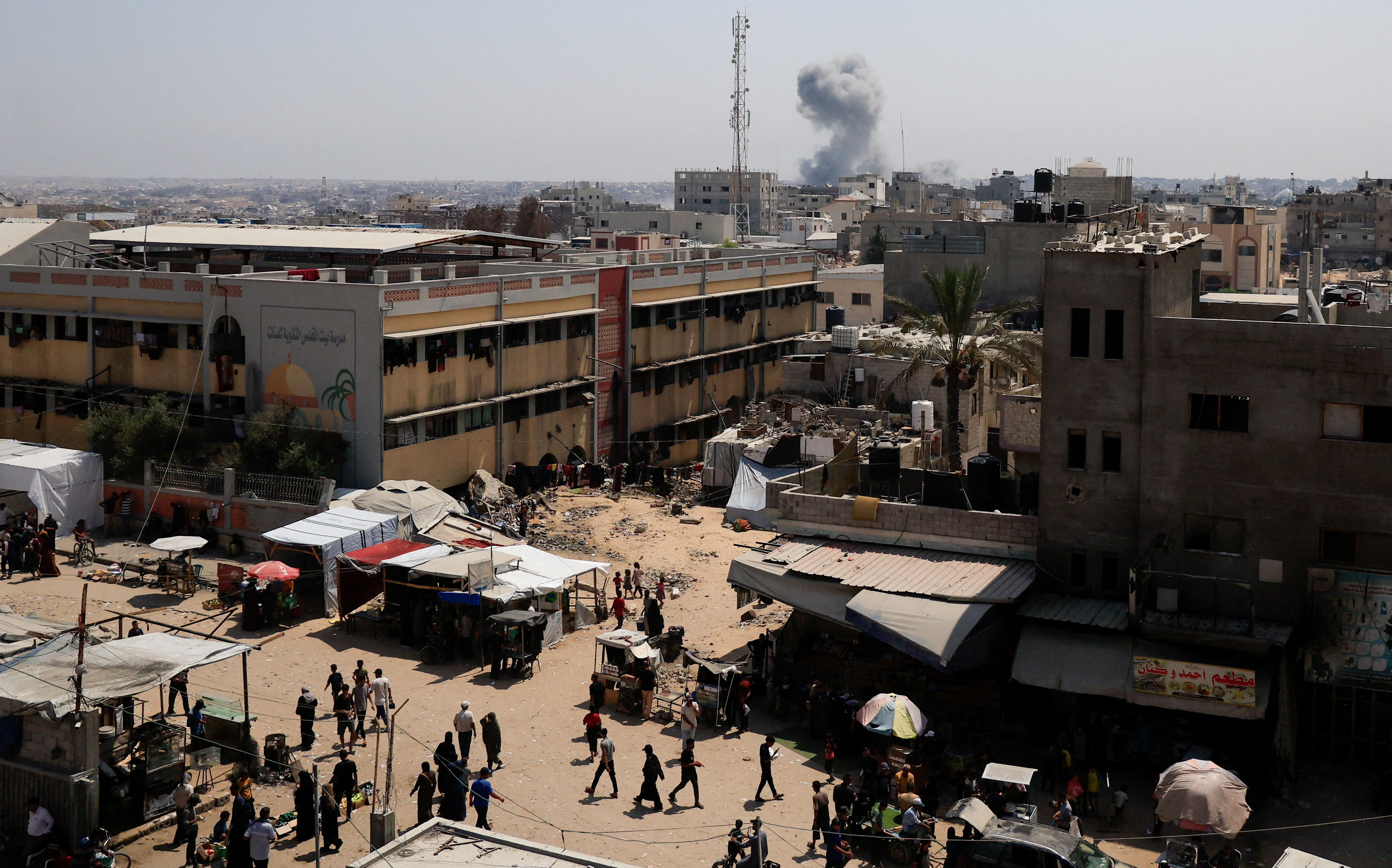 Smoke rises following an Israeli strike, in Khan Younis