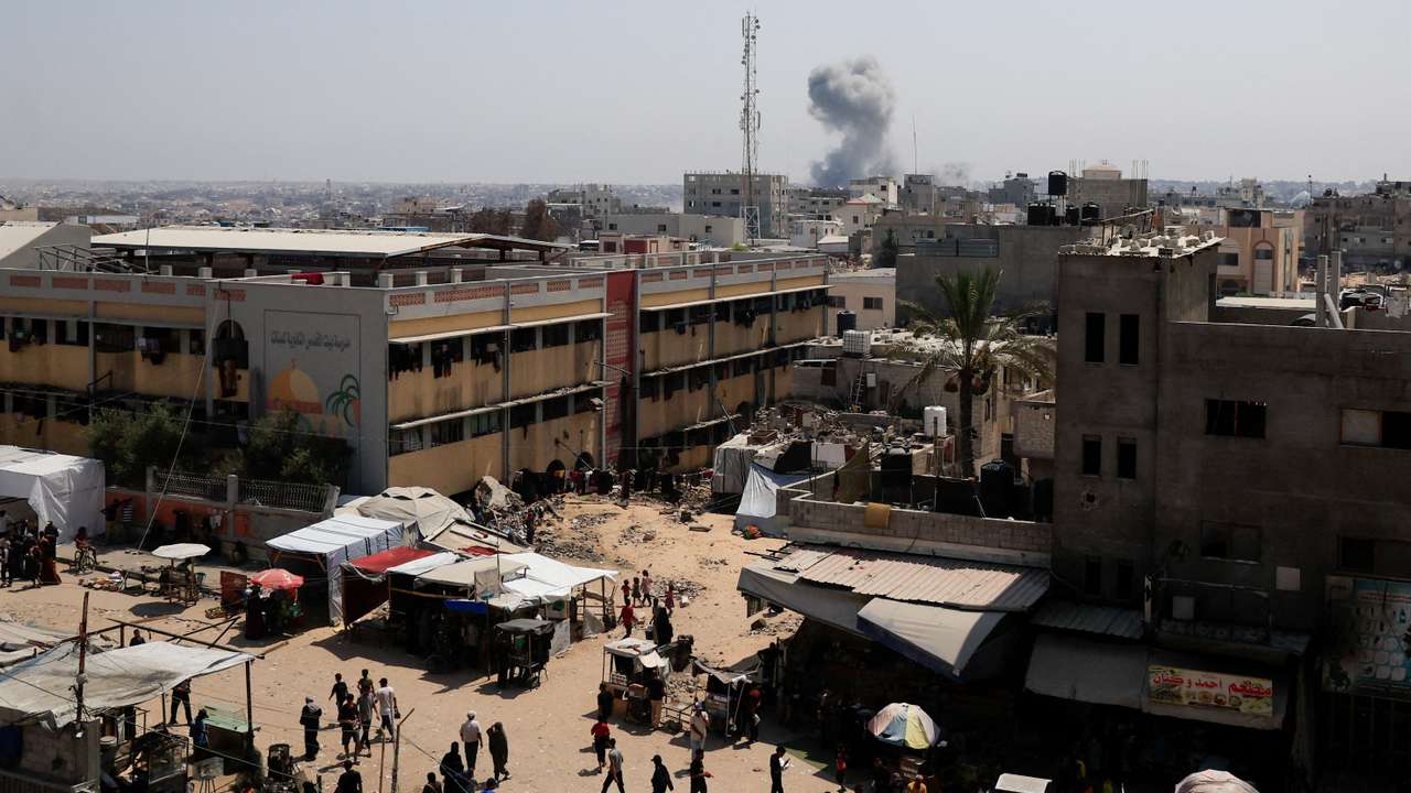 Smoke rises following an Israeli strike, in Khan Younis