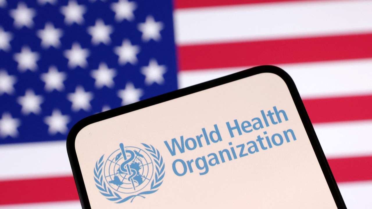 Illustration shows World Health Organization (WHO) logo and U.S. flag