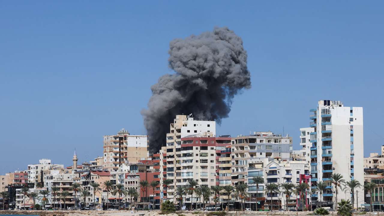Smoke billows over the UNESCO-listed port city of Tyre after Israeli strikes