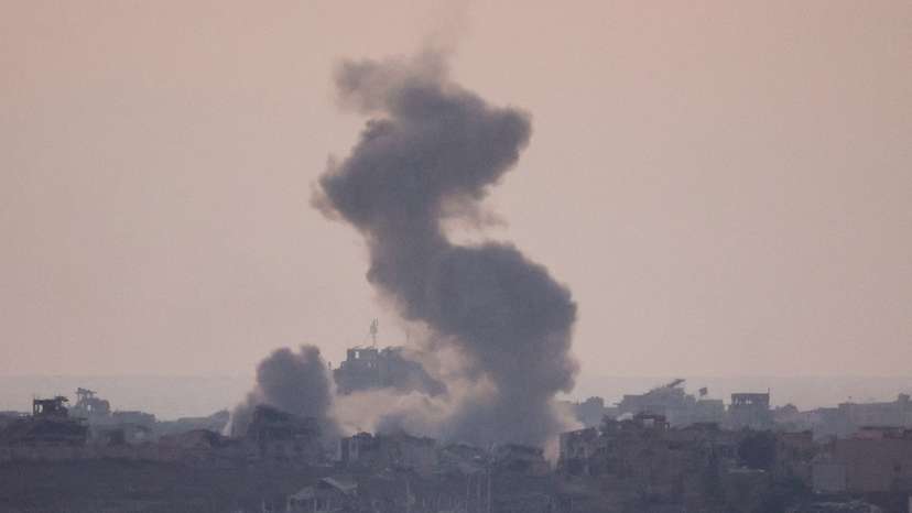 Smoke rises after an explosion in Gaza, seen from the Israel-Gaza border