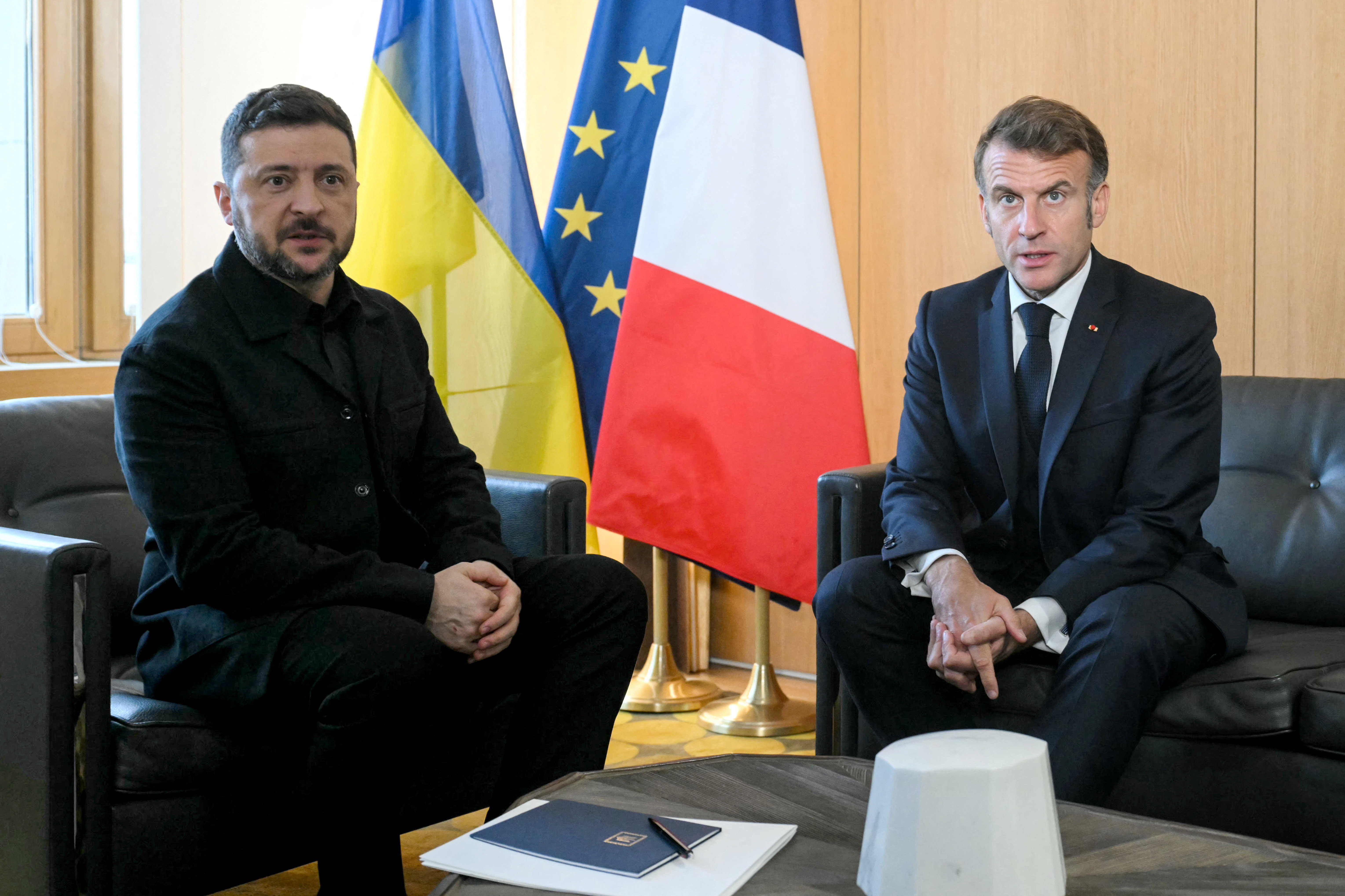 Ukraine's President Zelensky meets France's President Macron during a bilateral meeting, in Brussels