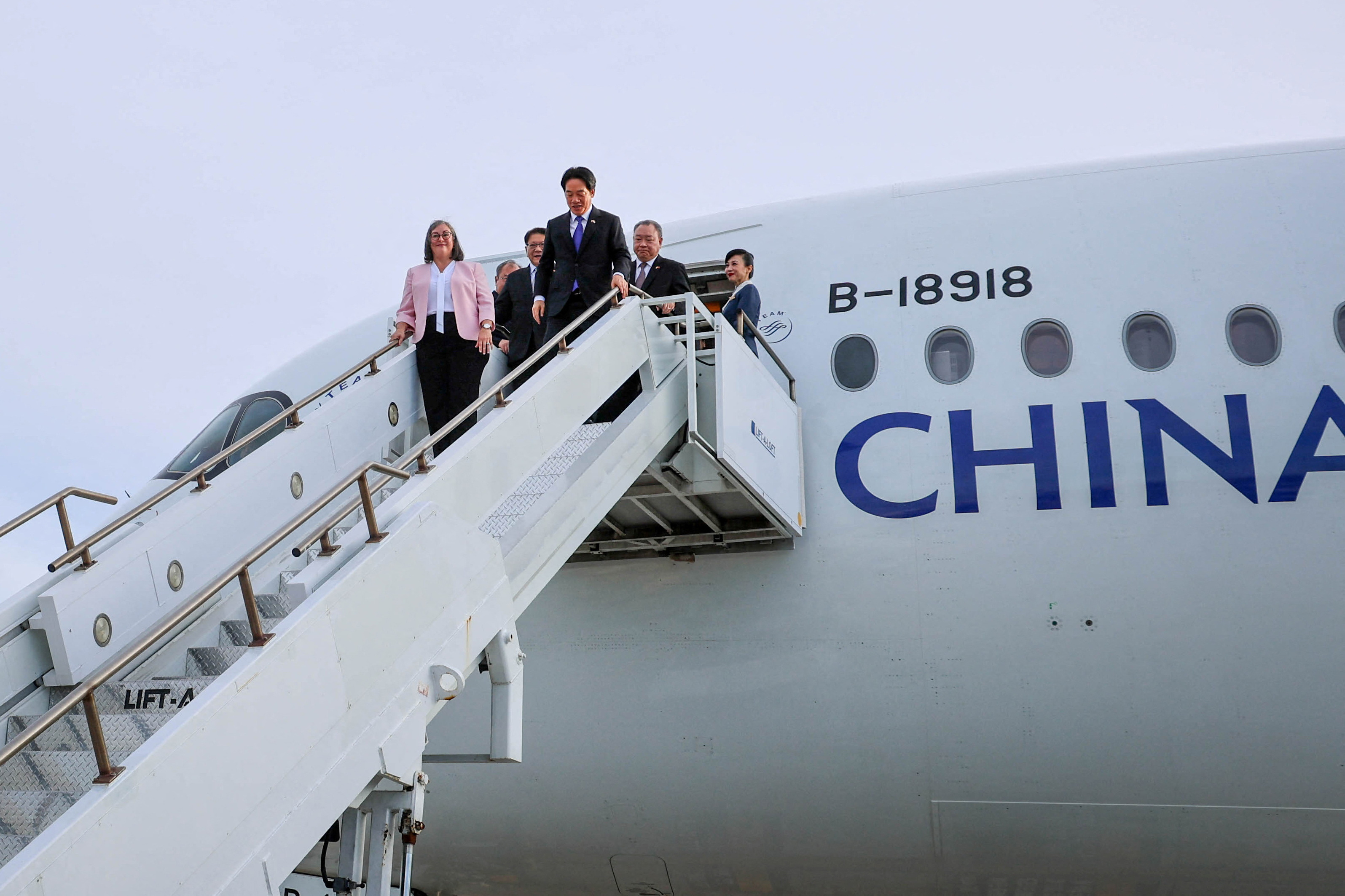 Hawaii Governor Josh Green greets Taiwan's President Lai Ching-te on his arrival in Honolulu