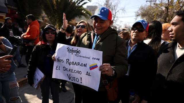 Voting during Venezuela's presidential elections, at the Venezuelan Embassy in Santiago