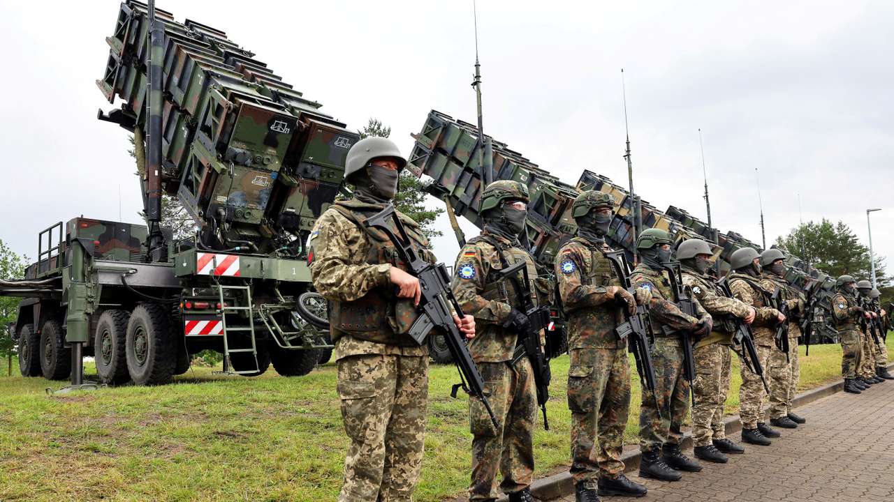FILE PHOTO: Ukrainian President Volodymyr Zelenskiy visit to a military training area