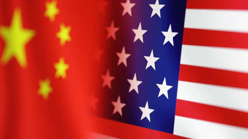 Illustration shows U.S. and Chinese flags