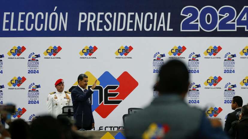 Venezuela's President Nicolas Maduro meets with Elvis Amoroso, head of the CNE, in Caracas