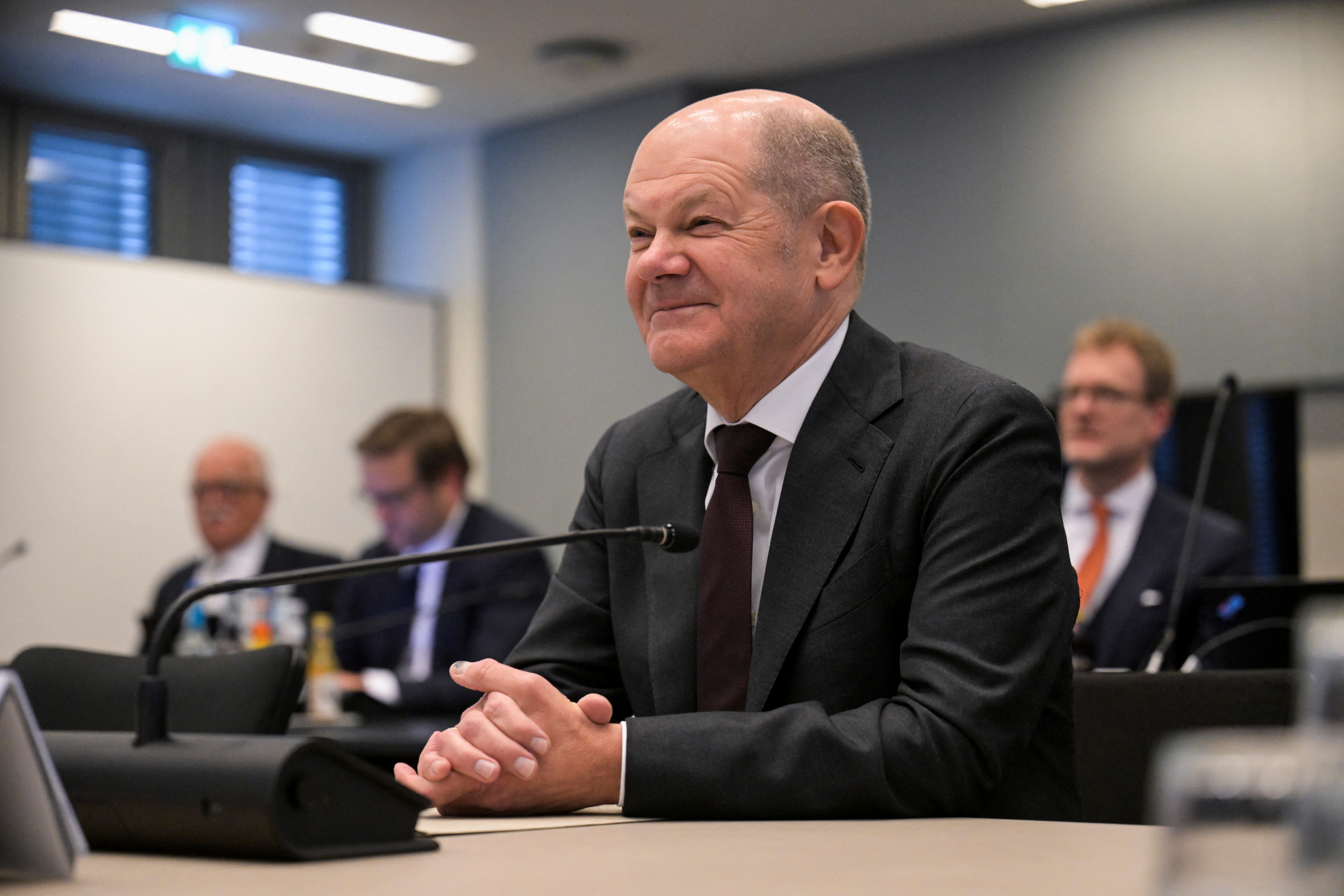 Germany's Chancellor Olaf Scholz attends a session to answer parliamentarians' questions, in Hamburg