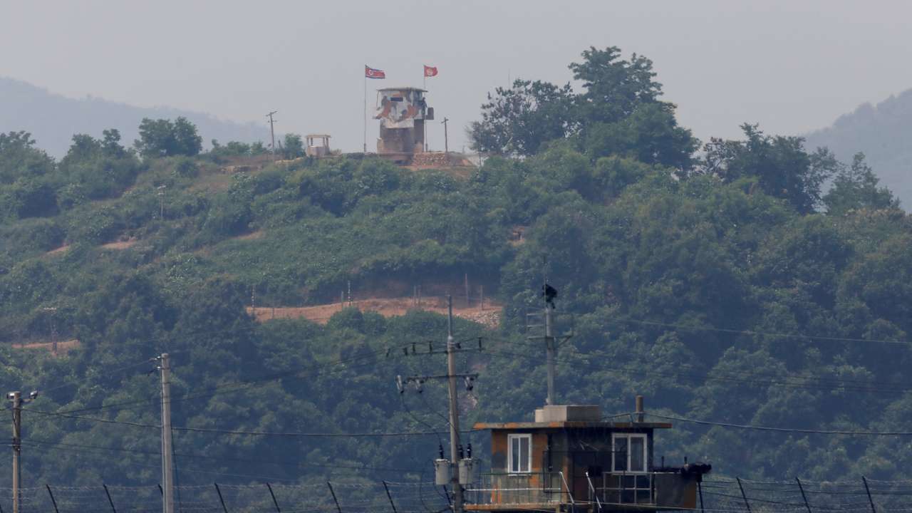 FILE PHOTO: A North Korean soldier stands guard at his guard post inside North Korean territory, in this picture taken from Paju, South Korea, near the demilitarized zone (DMZ) separating the two Koreas