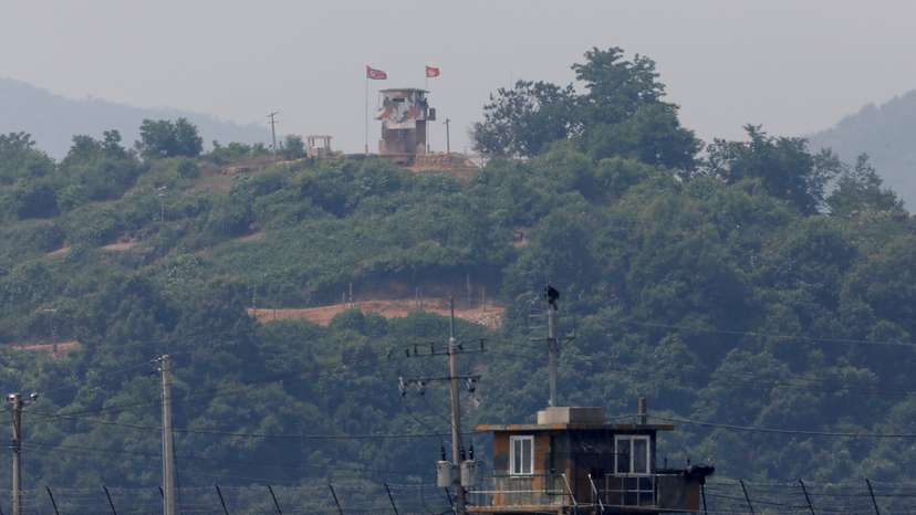 FILE PHOTO: A North Korean soldier stands guard at his guard post inside North Korean territory, in this picture taken from Paju, South Korea, near the demilitarized zone (DMZ) separating the two Koreas