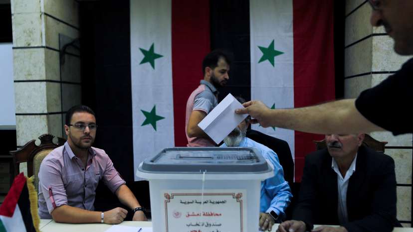 FILE PHOTO: Syrians vote in parliamentary elections in Damascus