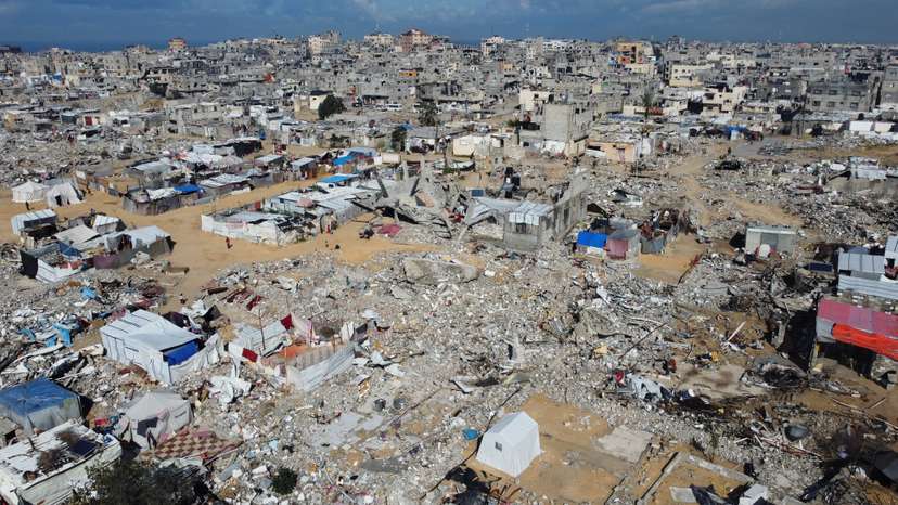 A drone view shows damaged and destroyed buildings, destroyed in the Israeli military offensive, following a ceasefire between Israel and Hamas