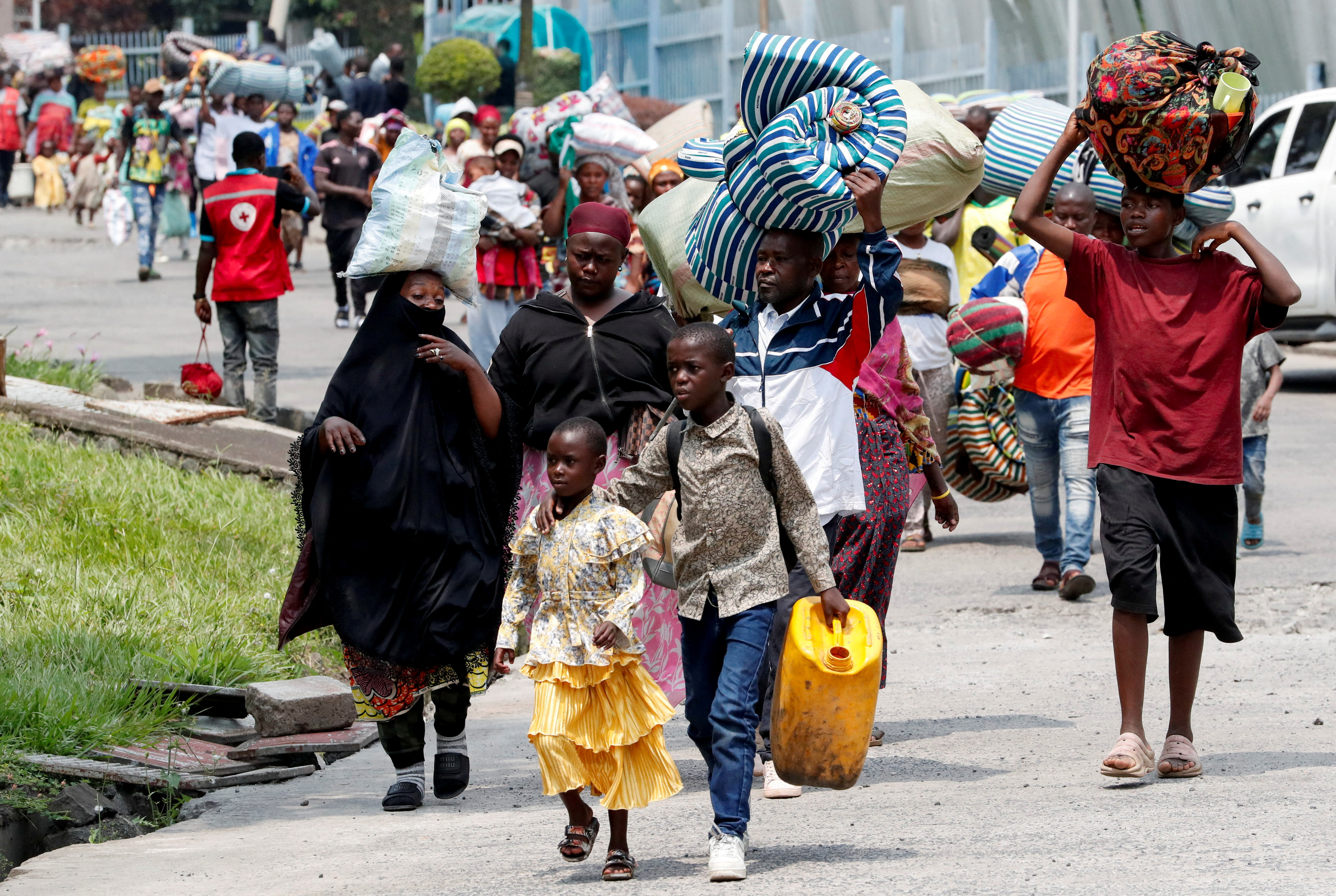 Congolese civilians who fled from Goma return to DRC