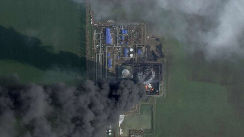 A satellite image shows smoke erupting from the Kavkazskaya depot in Krasnodar Region