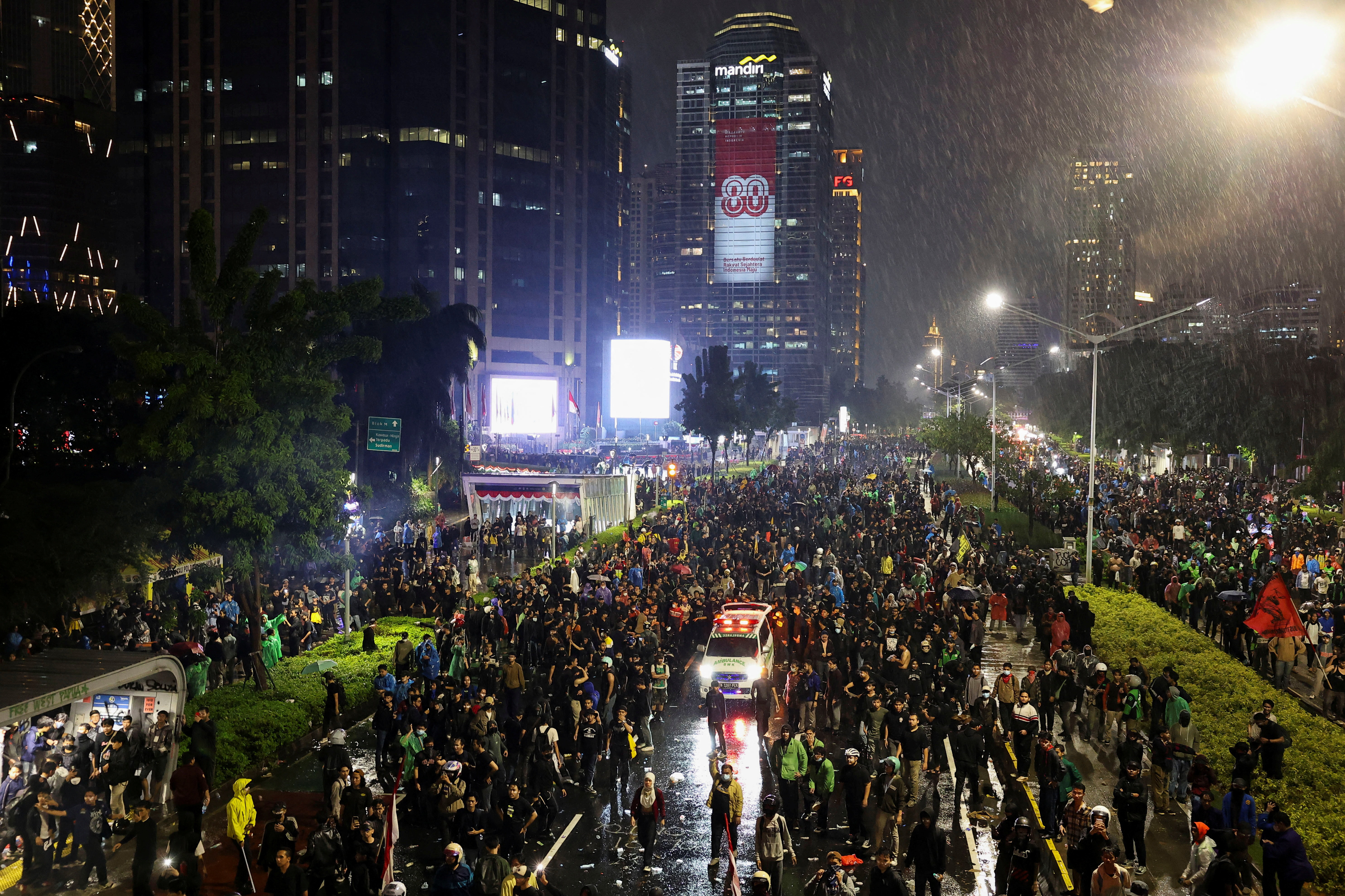 Protest outside Jakarta polie headquarters, after a motorcycle taxi driver died after being struck and run over by a police tactical vehicle, in Jakarta