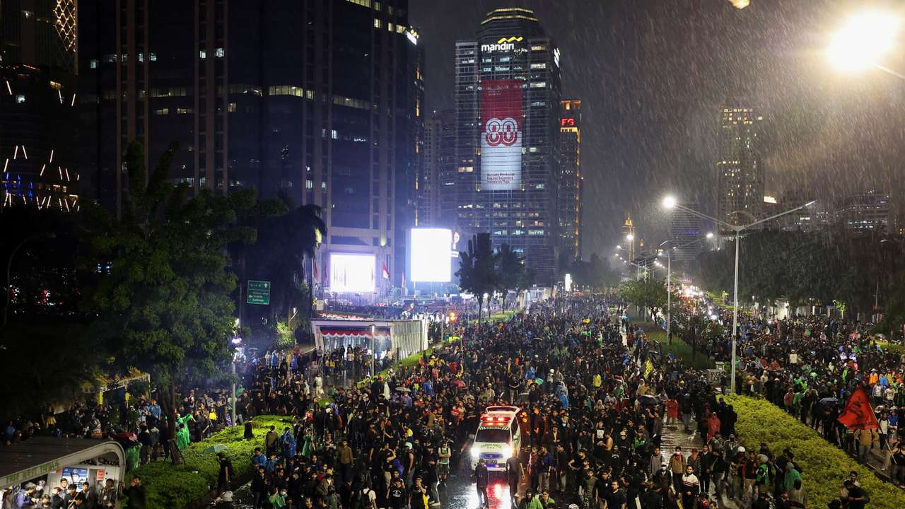 Protest outside Jakarta polie headquarters, after a motorcycle taxi driver died after being struck and run over by a police tactical vehicle, in Jakarta