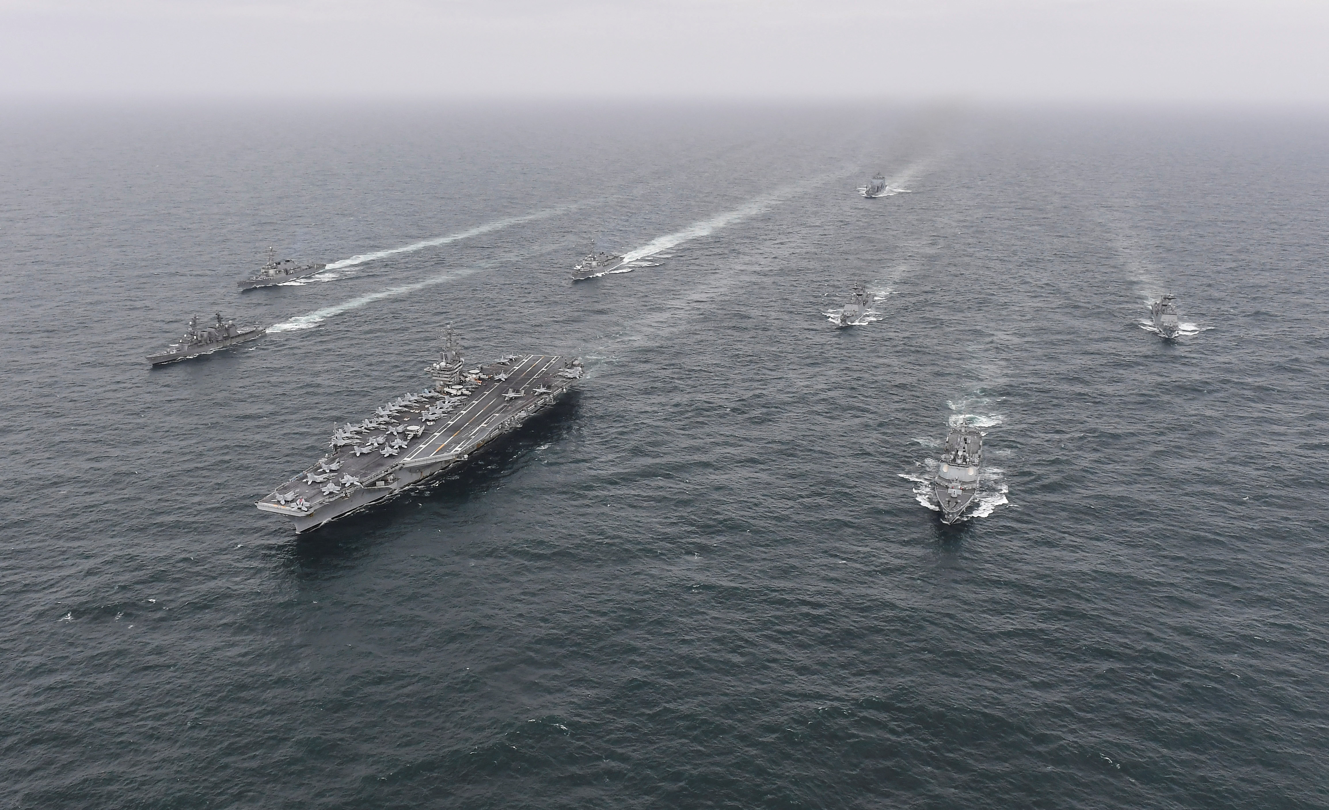 Naval vessels from South Korea, the U.S. and Japan navies take part in a combined anti-submarine exercises