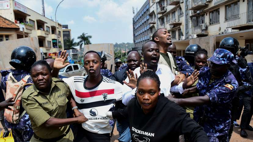 Ugandan security forces detain young protesters marching in Kampala