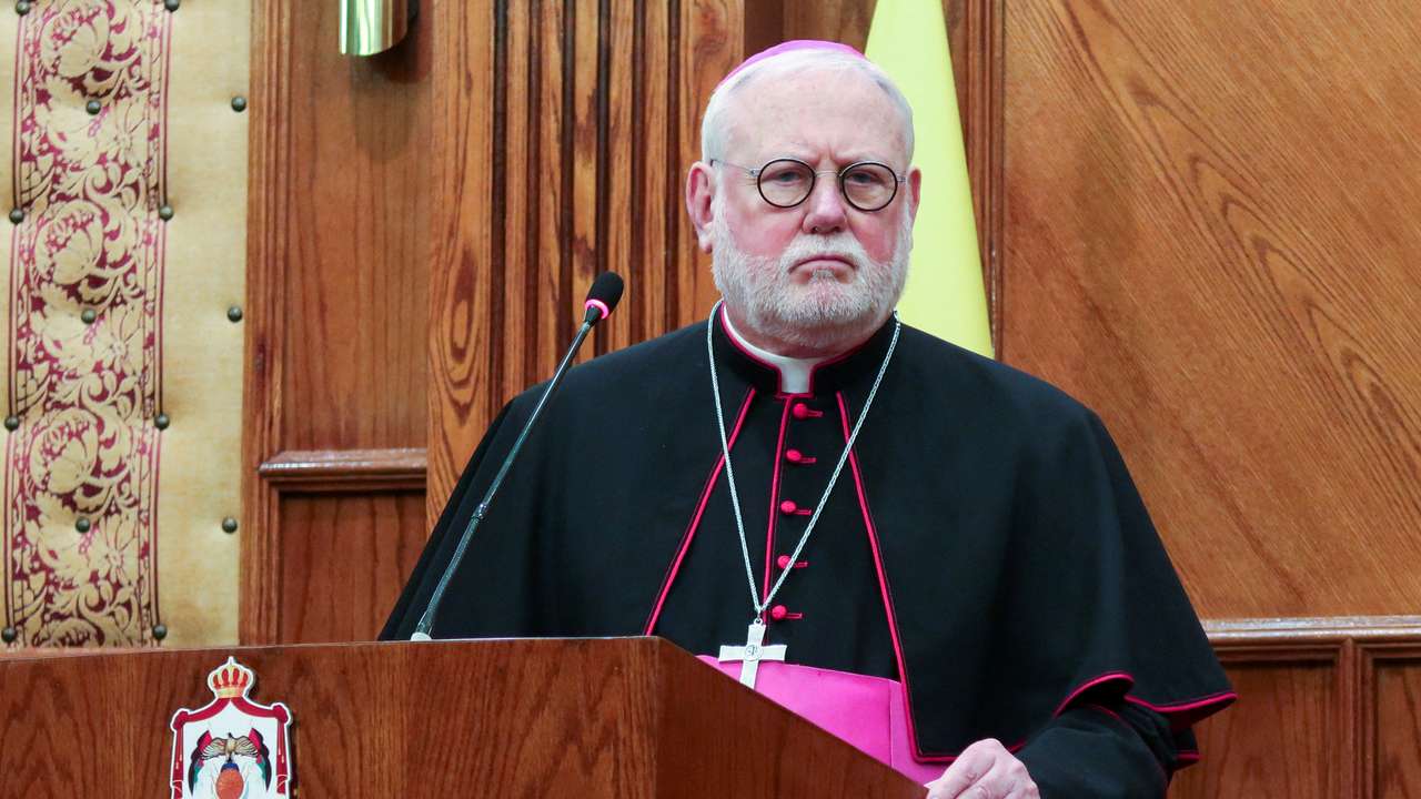 Archbishop Paul Richard Gallagher attends a joint press conference with Jordan's Foreign Minister Ayman Safadi in Amman
