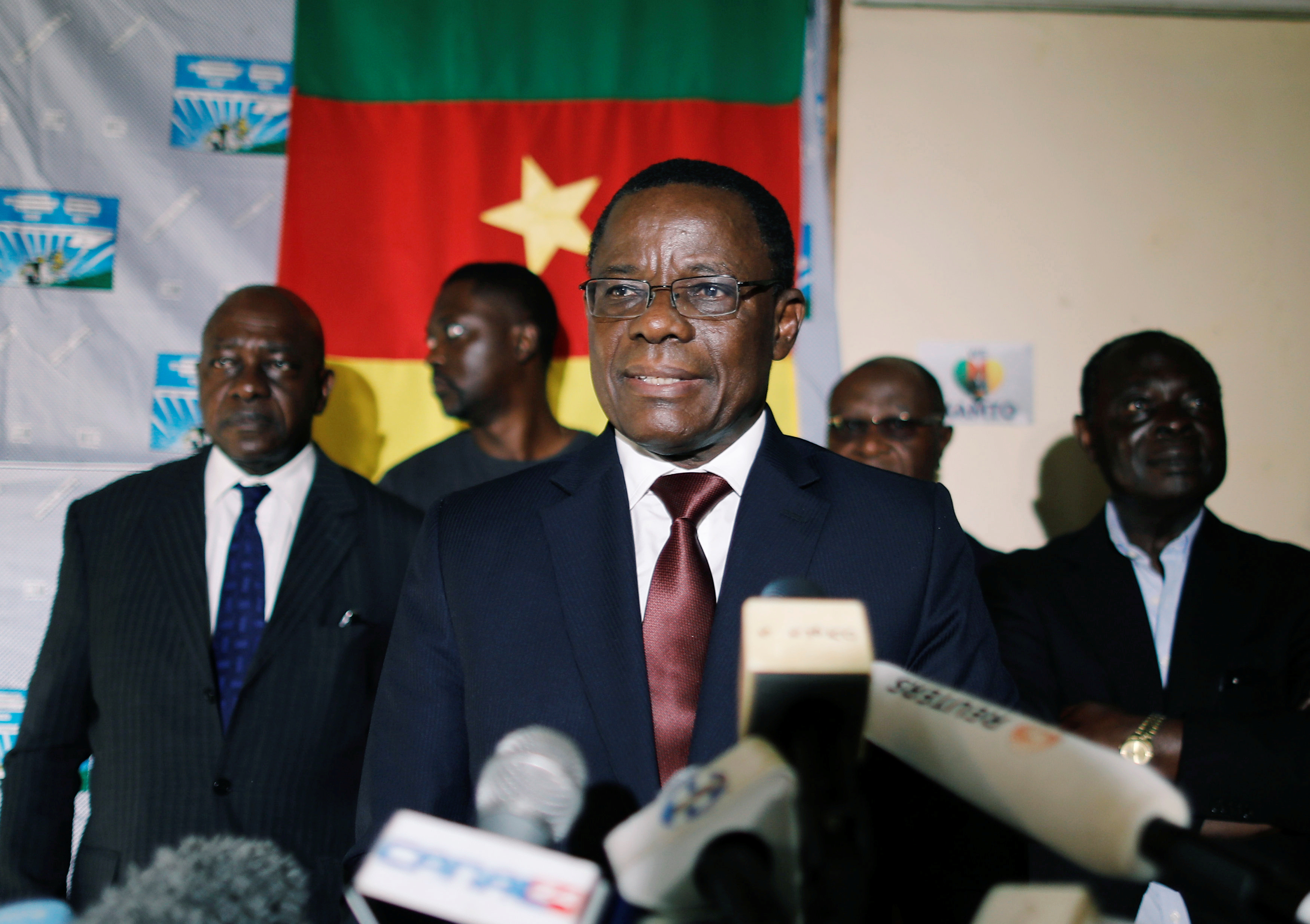 Maurice Kamto, a presidential candidate of Renaissance Movement (MRC), reacts as he holds a news conference at his headquarter in Yaounde,