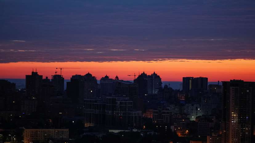 A view of the city at sunrise during an air raid alert in Kyiv
