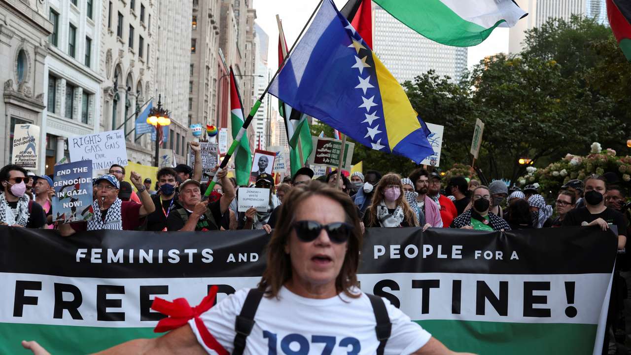 People take part in a protest organized by pro-abortion rights, pro-LGBT rights and pro-Palestinian activists, in Chicago