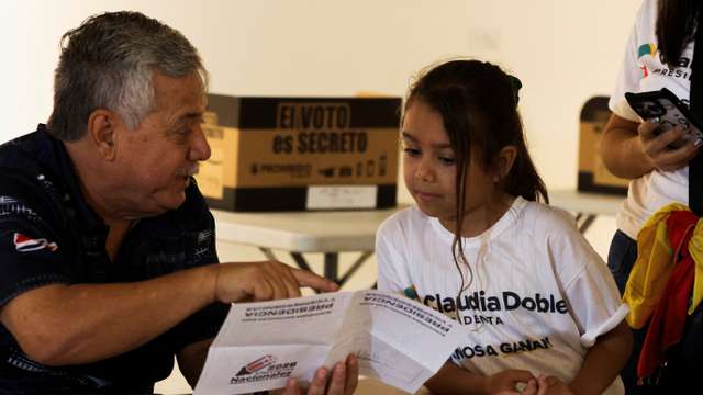 Children take part in a symbolic election at the Children's Museum during Costa Rica's general election day in San Jose