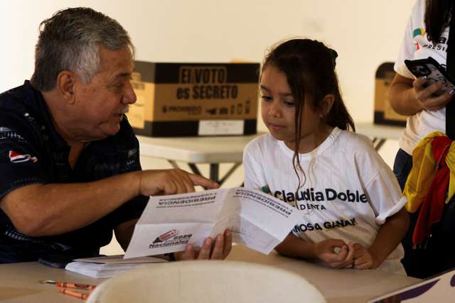 Children take part in a symbolic election at the Children's Museum during Costa Rica's general election day in San Jose
