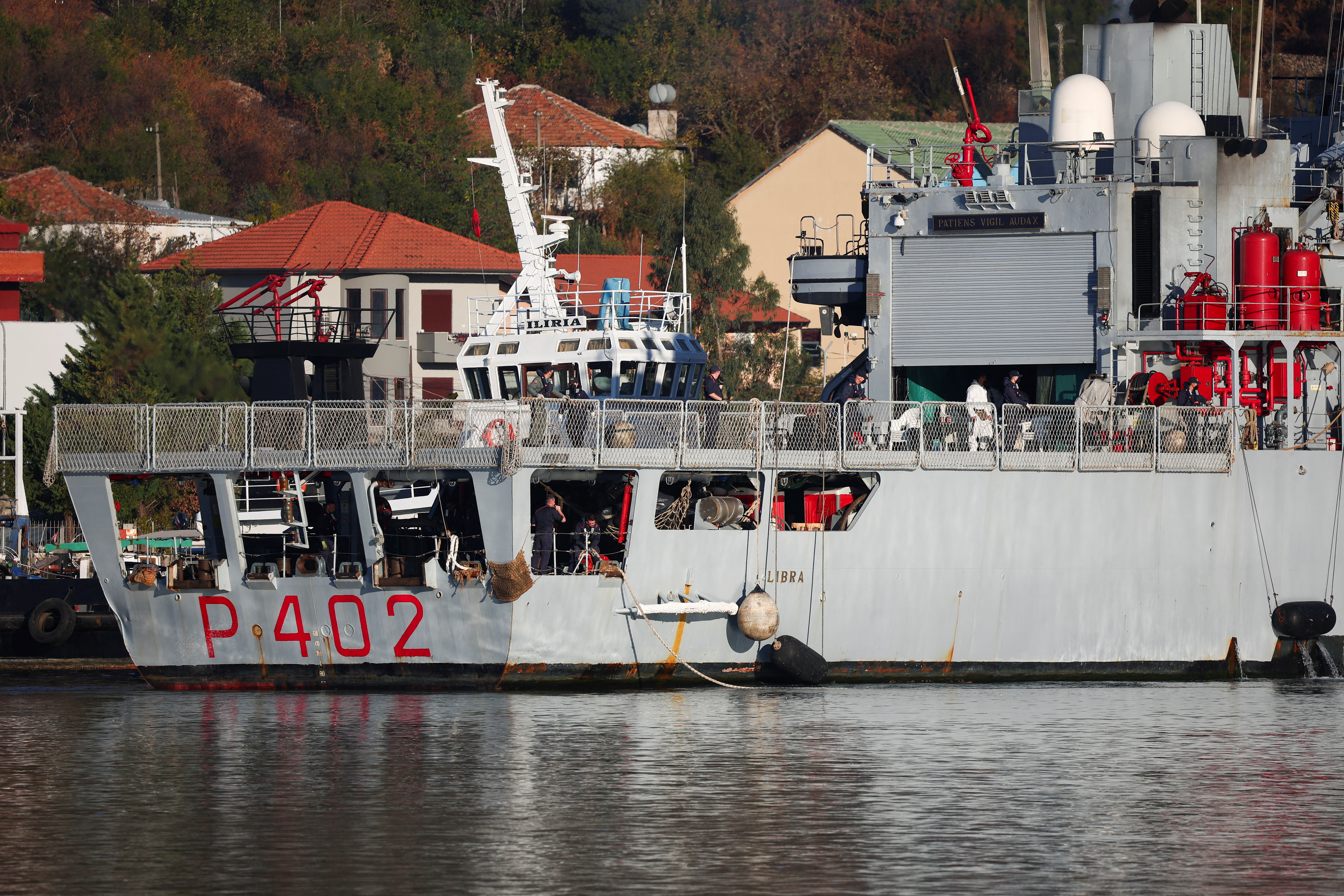 Italian navy ship Libra carrying migrants arrives in Shengjin