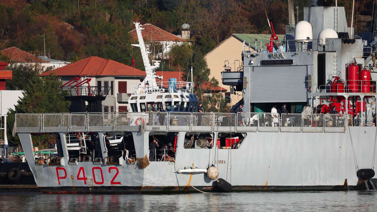 Italian navy ship Libra carrying migrants arrives in Shengjin